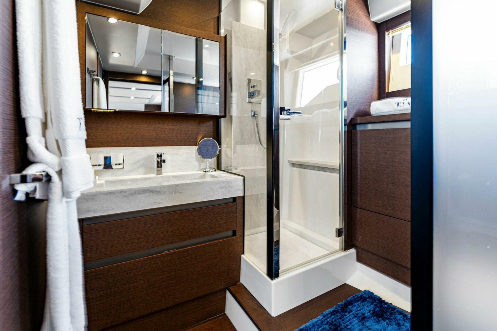 Slide: The Image of 2019 63 Prestige Flybridge - RT Time - Master Stateroom Head - 4199792
