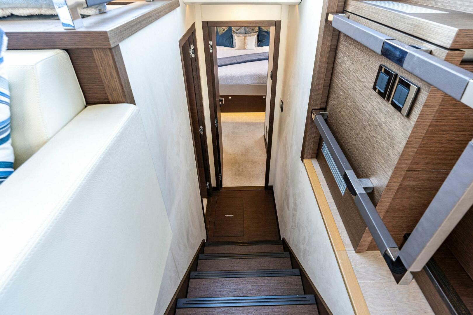 Slide: The Image of 2019 63 Prestige Flybridge - RT Time - Companionway to Staterooms - 4199796