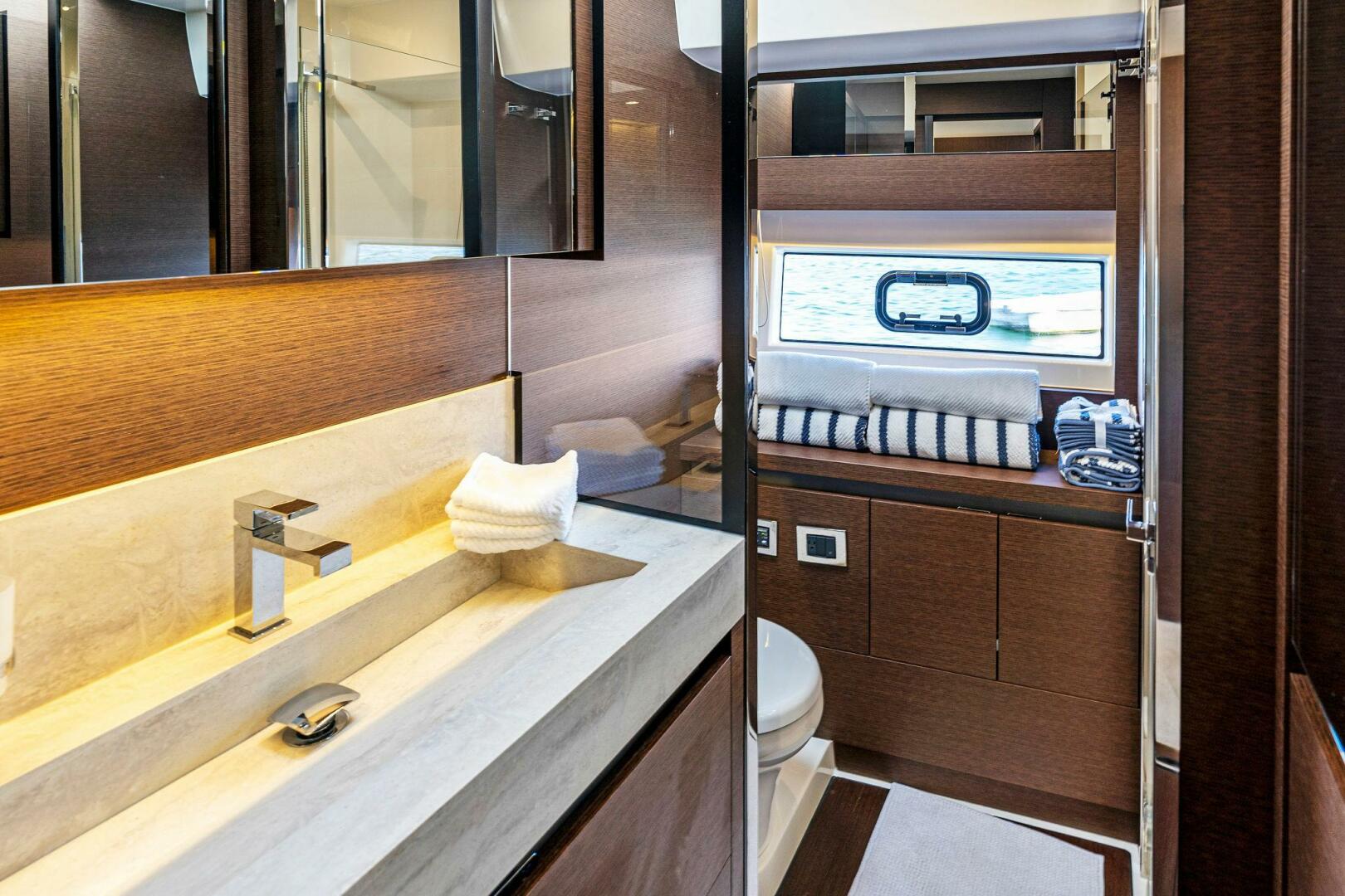 Slide: The Image of 2019 63 Prestige Flybridge - RT Time - VIP Stateroom Head - 4199807