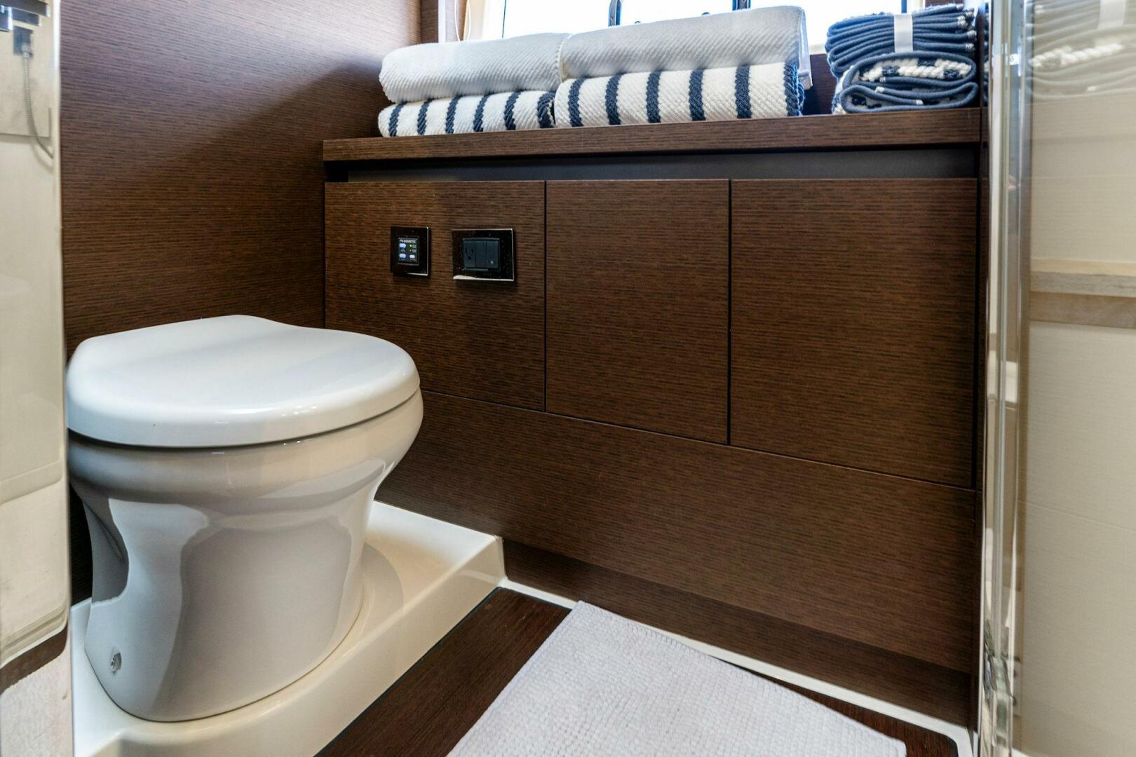 Slide: The Image of 2019 63 Prestige Flybridge - RT Time - VIP Stateroom Head - 4199809