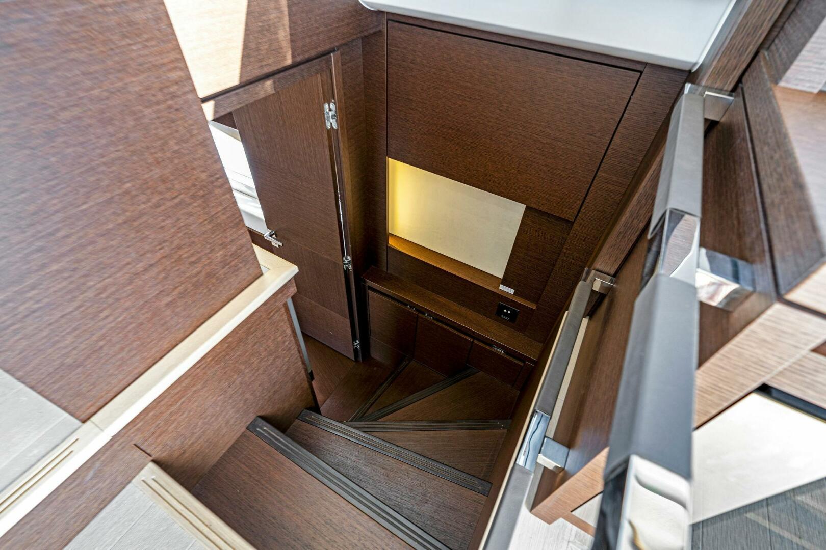 Slide: The Image of 2019 63 Prestige Flybridge - RT Time - Companionway to Master Stateroom - 4199810