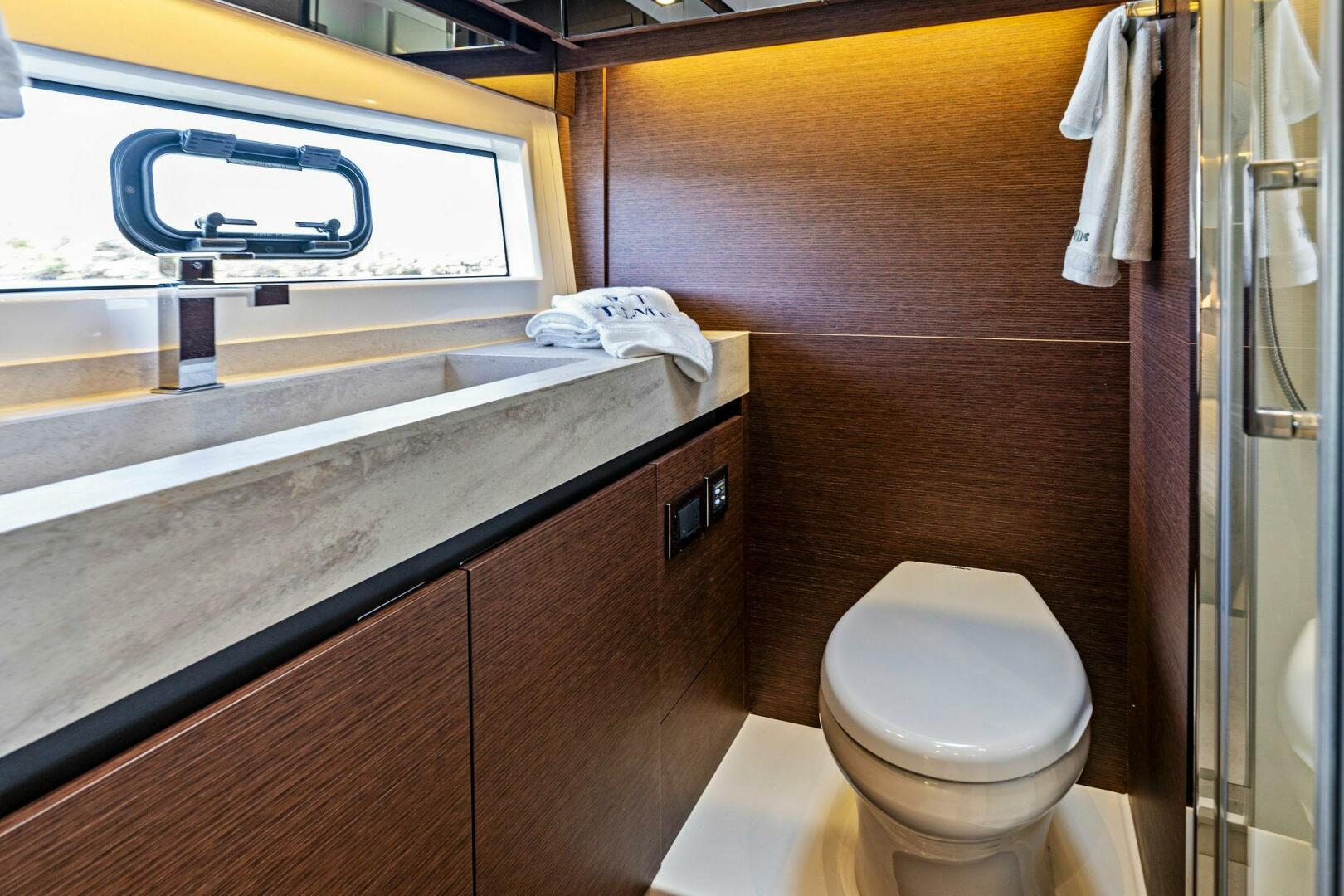 Slide: The Image of 2019 63 Prestige Flybridge - RT Time - Guest Stateroom Head - 4199846