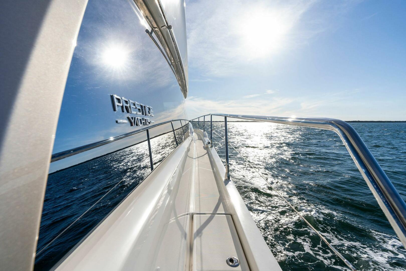 Slide: The Image of 2019 63 Prestige Flybridge - RT Time - Walkway to Bow - 4199911