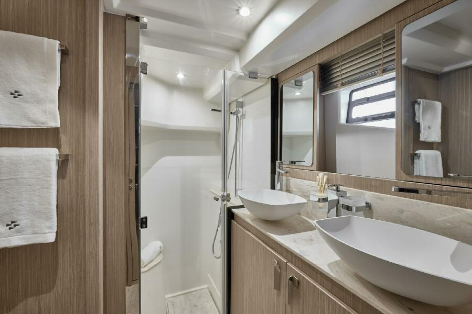 Slide: The Image of 2025 49 Prestige F4 Flybridge - VIP Stateroom Head/Shower Stall Sistership - 4070802