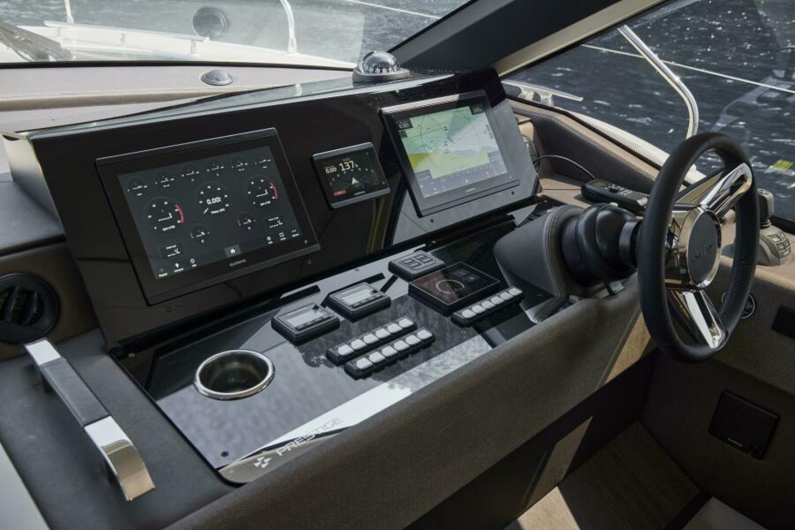 Slide: The Image of 2025 49 Prestige F4 Flybridge - Helm/Electronics Sistership - 4070795