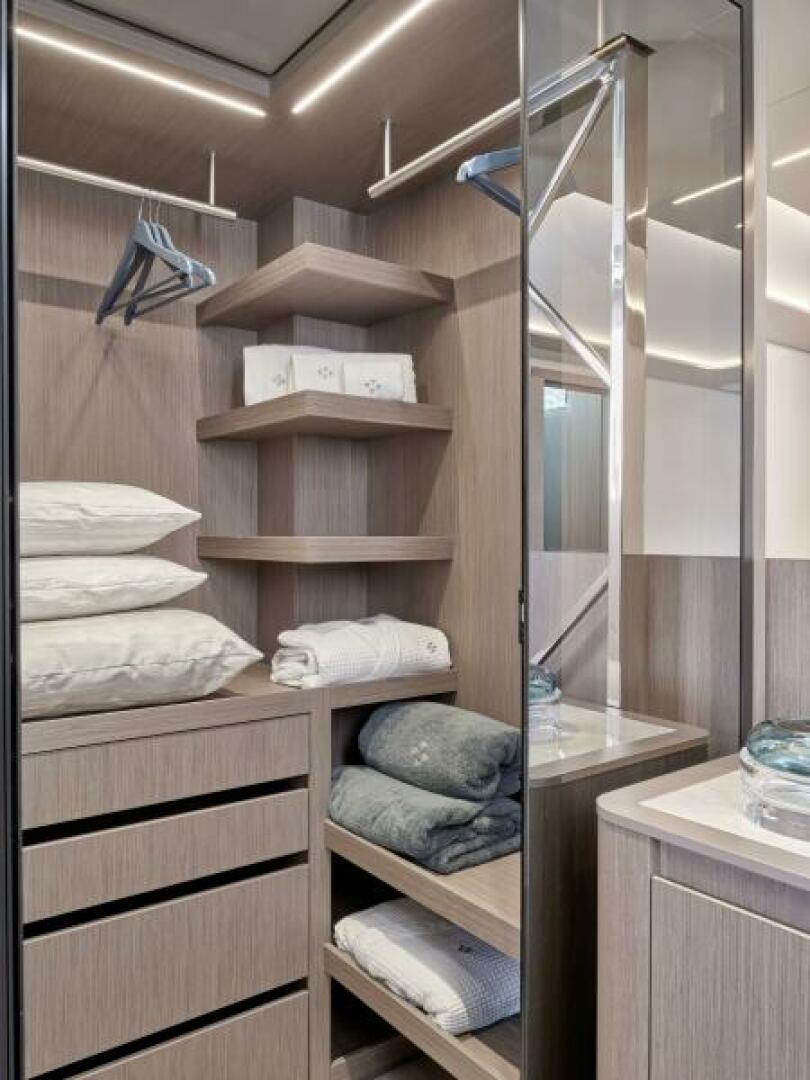 Slide: The Image of 2025 65 Prestige M8 Multi-Hull Power Catamaran - Manufacturer Master Stateroom Closet - 4354571