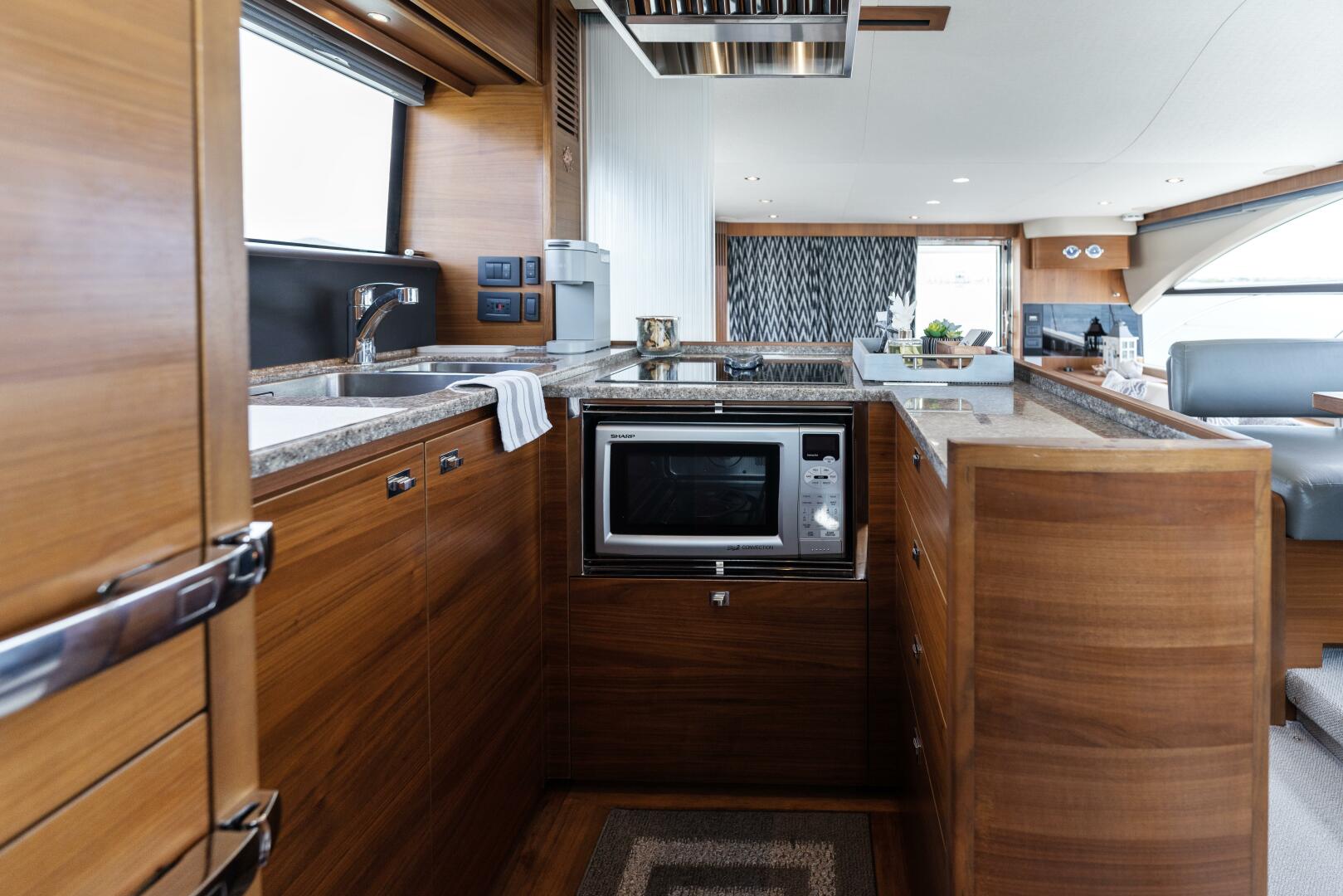 Slide: The Image of 2015 60 Princess Flybridge Plane 2 Sea Galley (2) - 3815144
