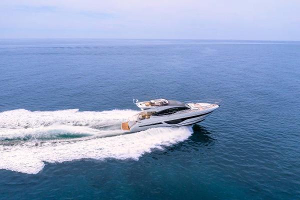 Slide: The Image of Luxury Princess S65 yacht cruising on open sea, 2025 model. - 0