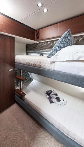 Slide: The Image of Luxury bunk beds in 2025 Princess S65 yacht cabin interior. - 17