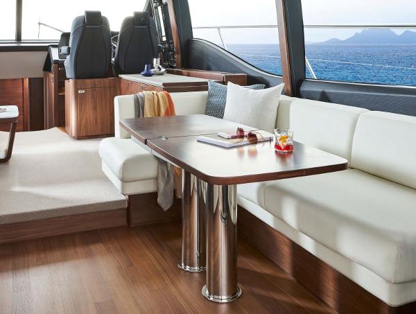 Slide: The Image of Luxurious interior of 2025 Princess S65 yacht with ocean view and elegant seating area. - 4