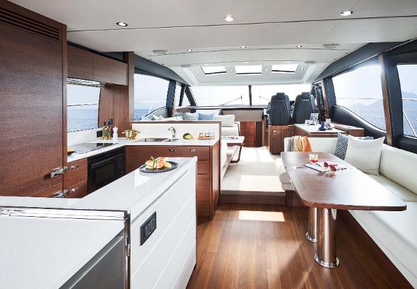 Slide: The Image of Luxurious interior of 2025 Princess S65 yacht with modern kitchen and seating area. - 7