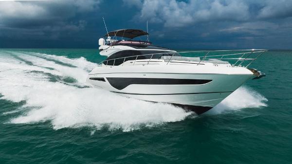 Slide: The Image of 2022 Princess S66 yacht cruising on turquoise ocean under cloudy sky. - 14