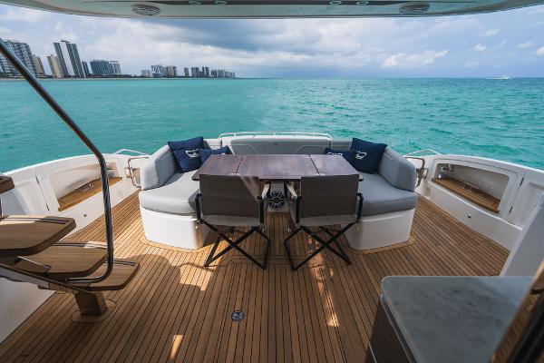 Slide: The Image of Luxury 2022 Princess S66 yacht deck with ocean view and seating area. - 31
