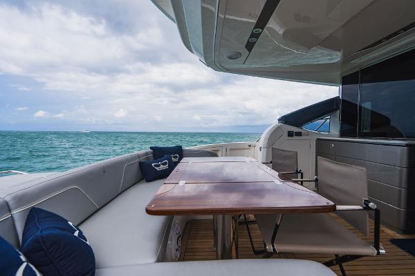 Slide: The Image of Luxury yacht Princess S66 2022, featuring elegant outdoor seating with ocean view. - 35