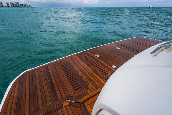 Slide: The Image of Luxury yacht Princess S66 2022 with elegant wooden deck on open sea. - 37