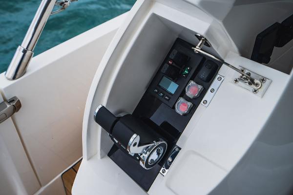 Slide: The Image of Control panel of 2022 Princess S66 yacht with throttle and switches. - 48