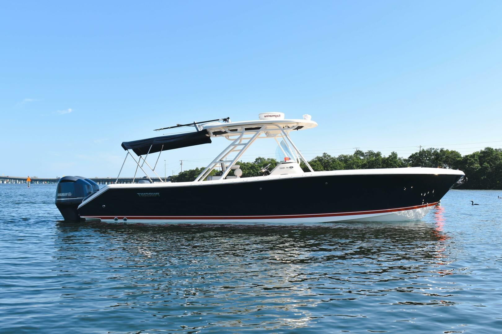 Slide: The Image of 2011 31 Pursuit S310 Center Console Profile - 3992782