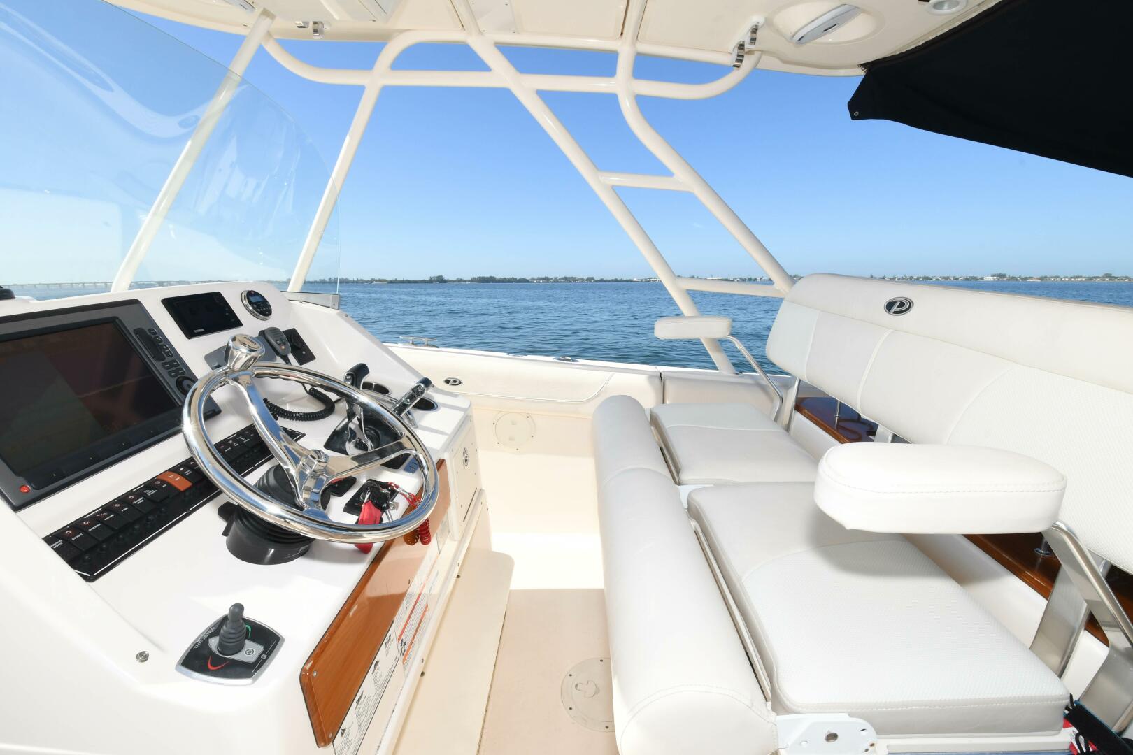 Slide: The Image of 2011 31 Pursuit S310 Center Console Helm - 3992733