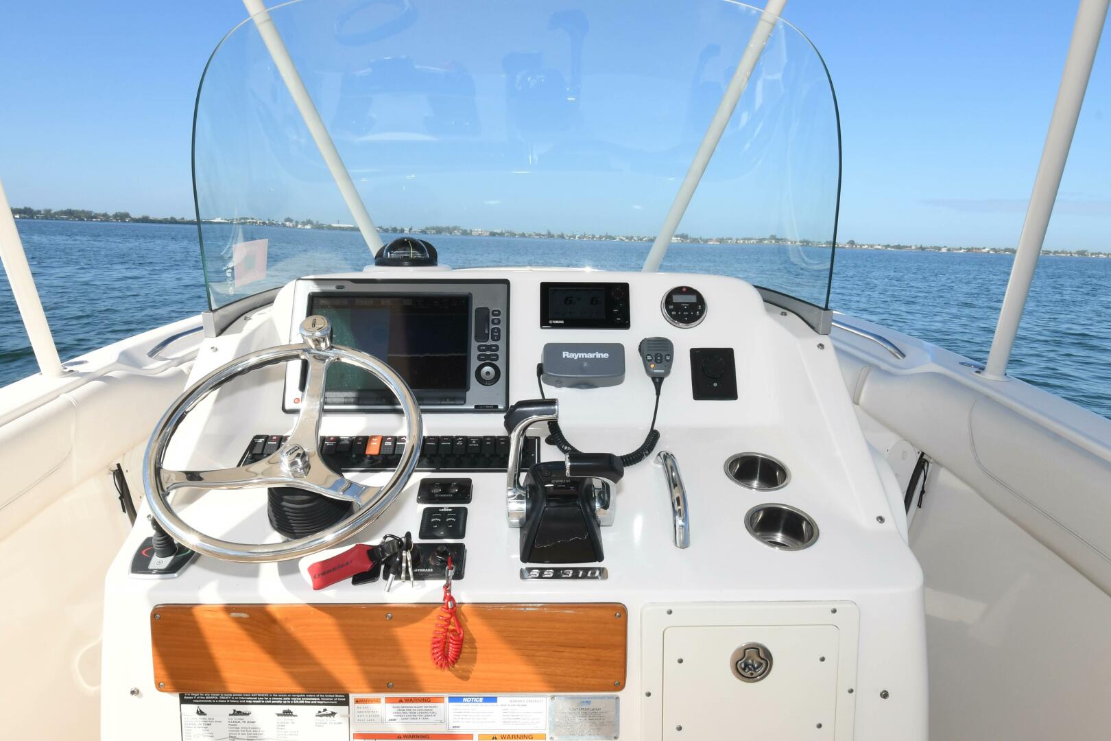 Slide: The Image of 2011 31 Pursuit S310 Center Console Helm - 3992736