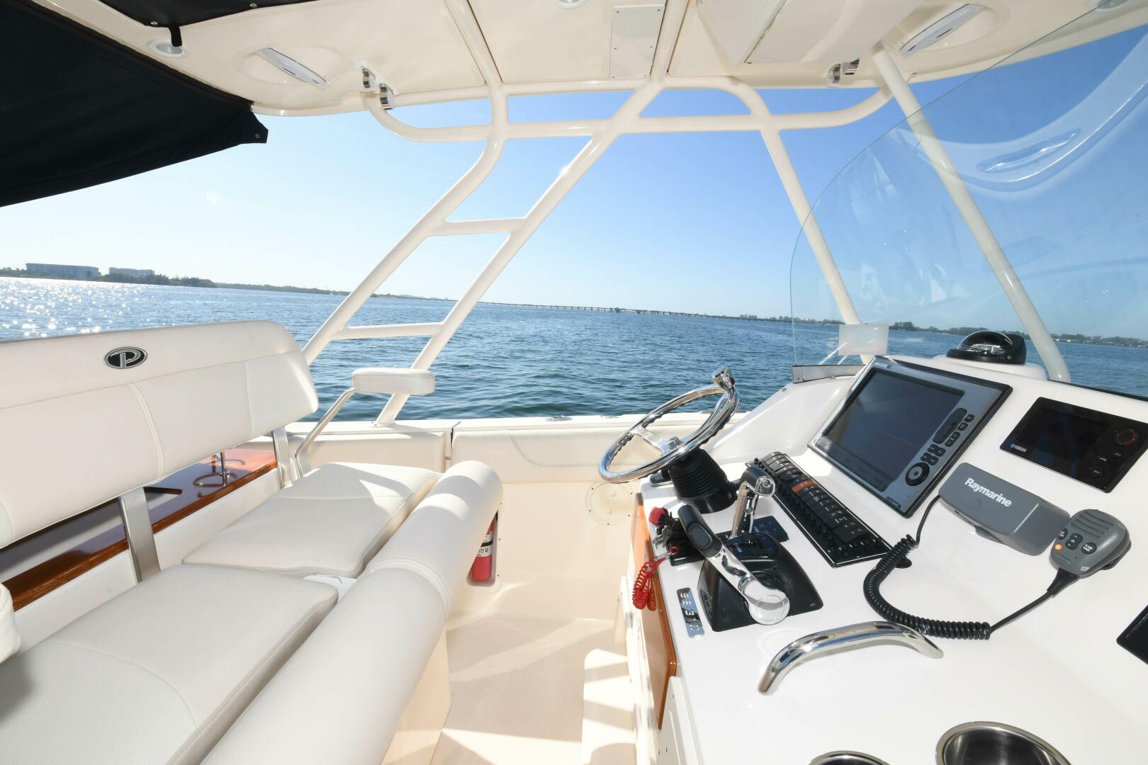 Slide: The Image of 2011 31 Pursuit S310 Center Console Helm - 3992734