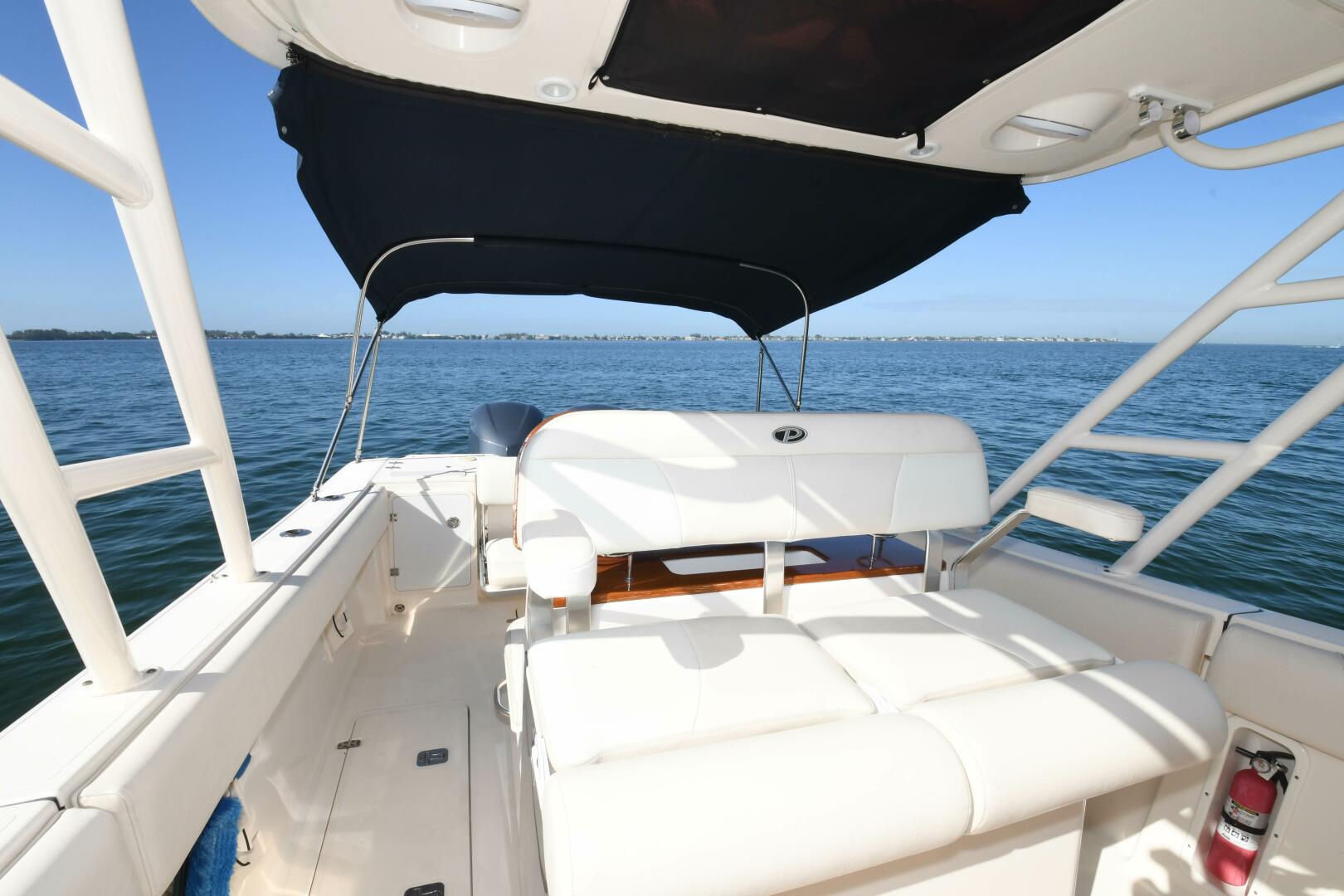 Slide: The Image of 2011 31 Pursuit S310 Center Console Helm - 3992732