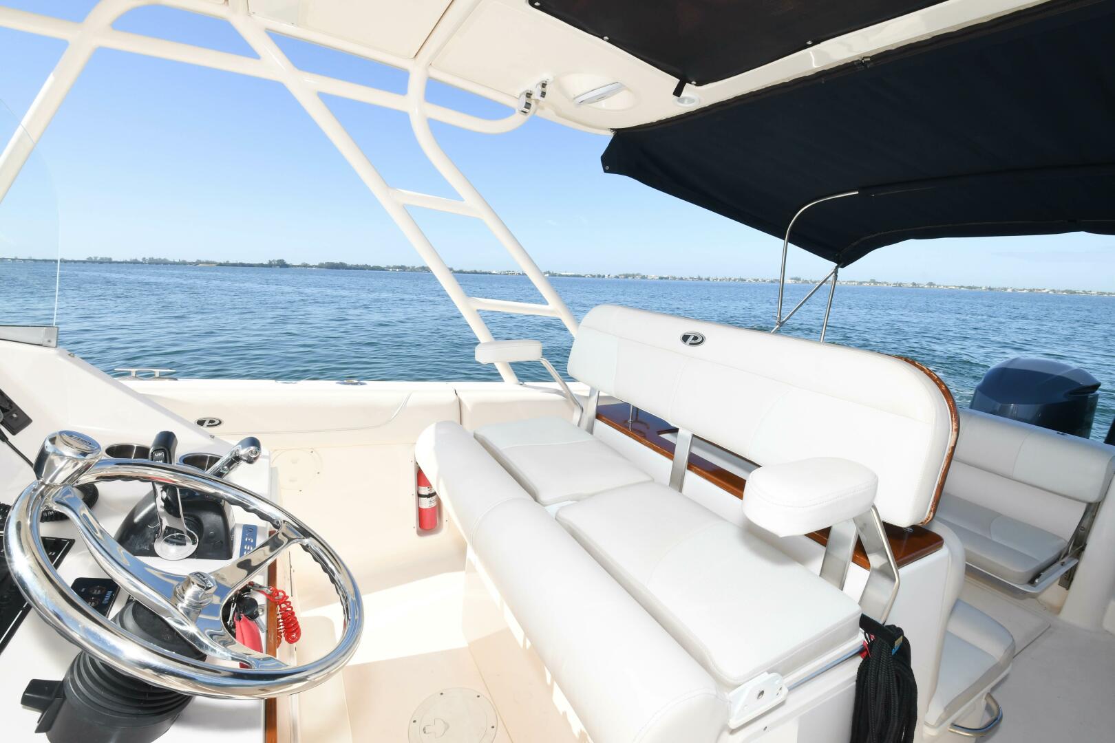 Slide: The Image of 2011 31 Pursuit S310 Center Console Helm - 3992721
