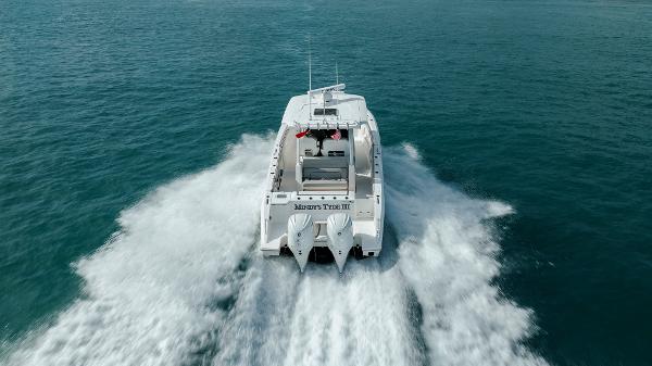Slide: The Image of 2022 Pursuit S 328 boat cruising on open water. - 13