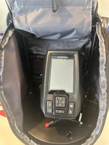 Slide: The Image of Garmin device inside Rabco Buccaneer 14 skiff, 2023 model, in a protective case. - 8