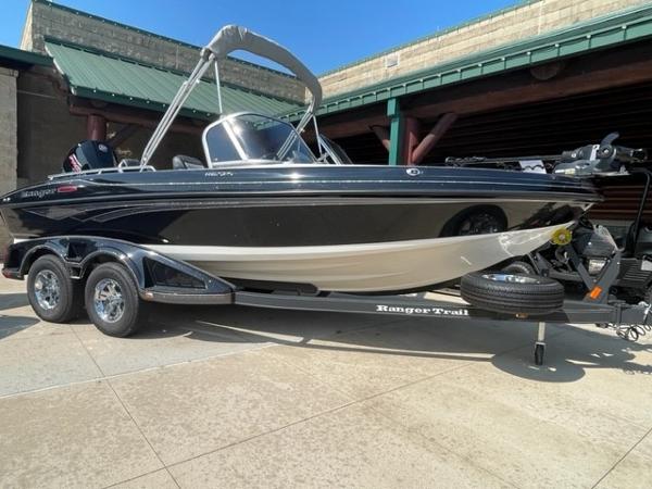 Slide: The Image of 2023 Ranger 1850MS boat on a trailer, black and white exterior. - 0