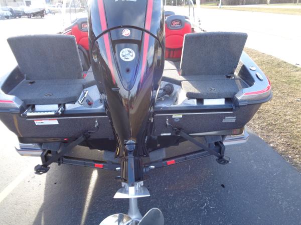 Slide: The Image of 2024 Ranger 1850 Reata boat rear view with motor and seating. - 13