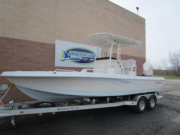 Slide: The Image of 2024 Ranger 2360 Bay boat on trailer at Grand Pointe Marina. - 2