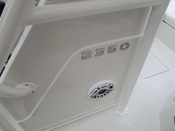 Slide: The Image of 2024 Ranger 2360 Bay boat interior detail with model number and speaker. - 24