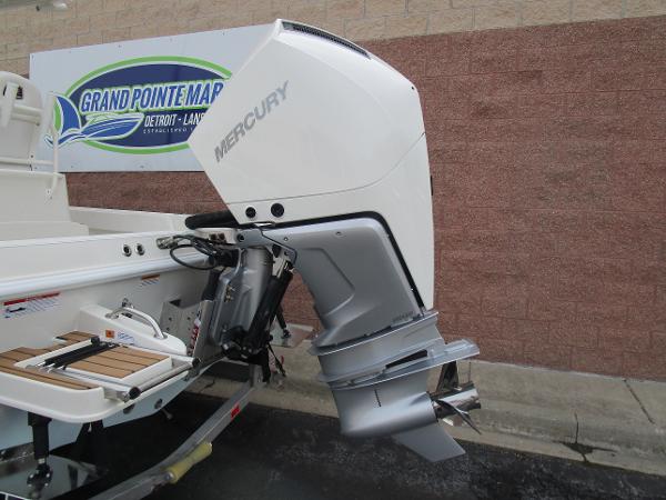 Slide: The Image of 2024 Ranger 2360 Bay boat with Mercury outboard motor at Grand Pointe Marina. - 6