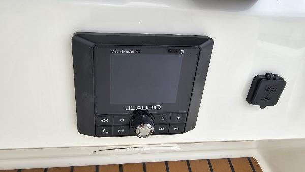 Slide: The Image of JL Audio system on 2024 Ranger 2600 Bay boat dashboard. - 29