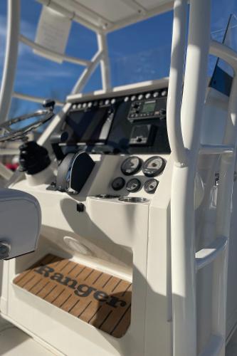 Slide: The Image of 2024 Ranger 2660 Bay boat console with advanced navigation and control systems. - 4