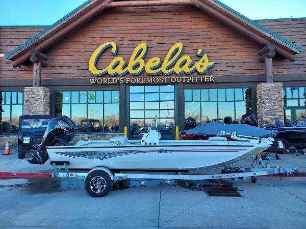 Slide: The Image of 2024 Ranger RB190 boat on trailer outside Cabela's store. - 0