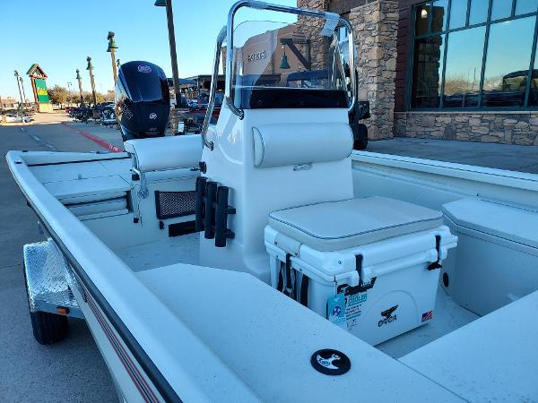 Slide: The Image of 2024 Ranger RB190 boat interior with seating and storage compartments. - 3