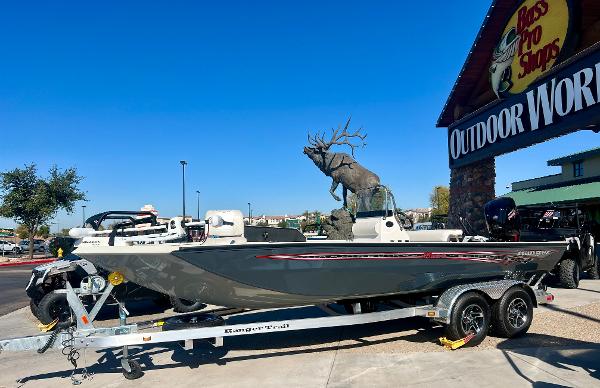Slide: The Image of 2023 Ranger RB200 boat on trailer outside Bass Pro Shops Outdoor World. - 0