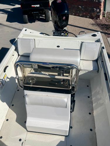 Slide: The Image of 2023 Ranger RB200 boat interior with seating and console. - 1