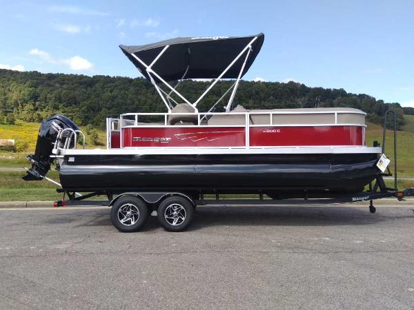 Slide: The Image of 2024 Ranger Reata 200C pontoon boat with canopy on trailer. - 2