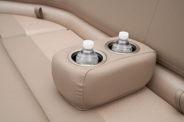 Slide: The Image of 2024 Ranger Reata 200C beige leather seats with built-in cup holders. - 28