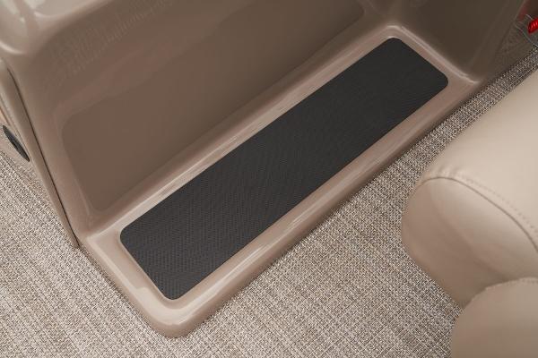 Slide: The Image of 2024 Ranger Reata 200C interior step with non-slip mat and carpeted flooring. - 33