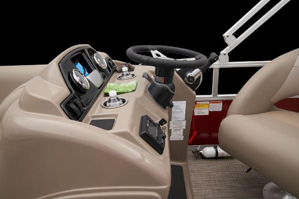 Slide: The Image of 2024 Ranger Reata 200C boat console with steering wheel and control panel. - 37