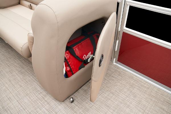 Slide: The Image of 2024 Ranger Reata 200C storage compartment with red bag. - 43
