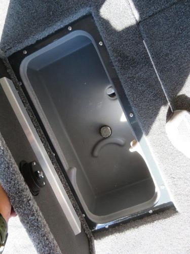 Slide: The Image of 2023 Ranger RT178C boat storage compartment with open lid. - 10