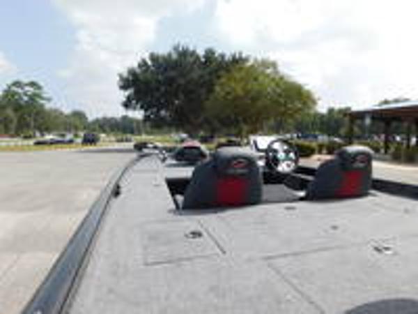 Slide: The Image of 2024 Ranger RT178C fishing boat interior with dual seats and steering wheel. - 1