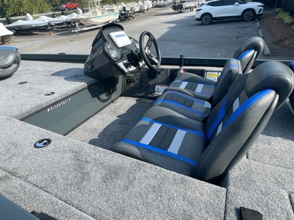 Slide: The Image of 2024 Ranger RT178C boat interior with steering console and three seats. - 5