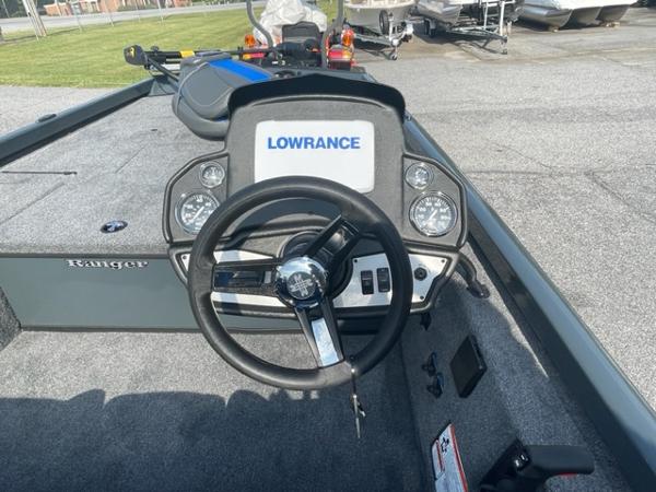 Slide: The Image of 2024 Ranger RT178C boat dashboard with Lowrance electronics and steering wheel. - 7