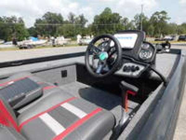 Slide: The Image of 2024 Ranger RT178C boat interior with steering wheel and dashboard. - 8