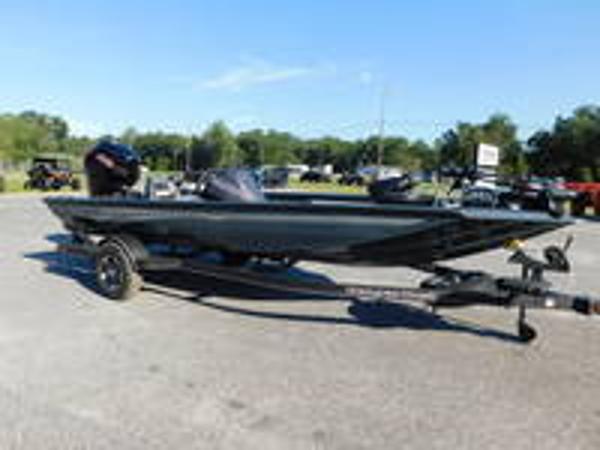 Slide: The Image of 2024 Ranger RT188 fishing boat on trailer in outdoor lot. - 2